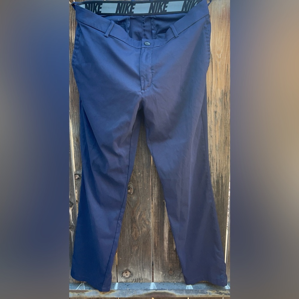 Nike Dri-FIT golf pants in a navy blue 32x30